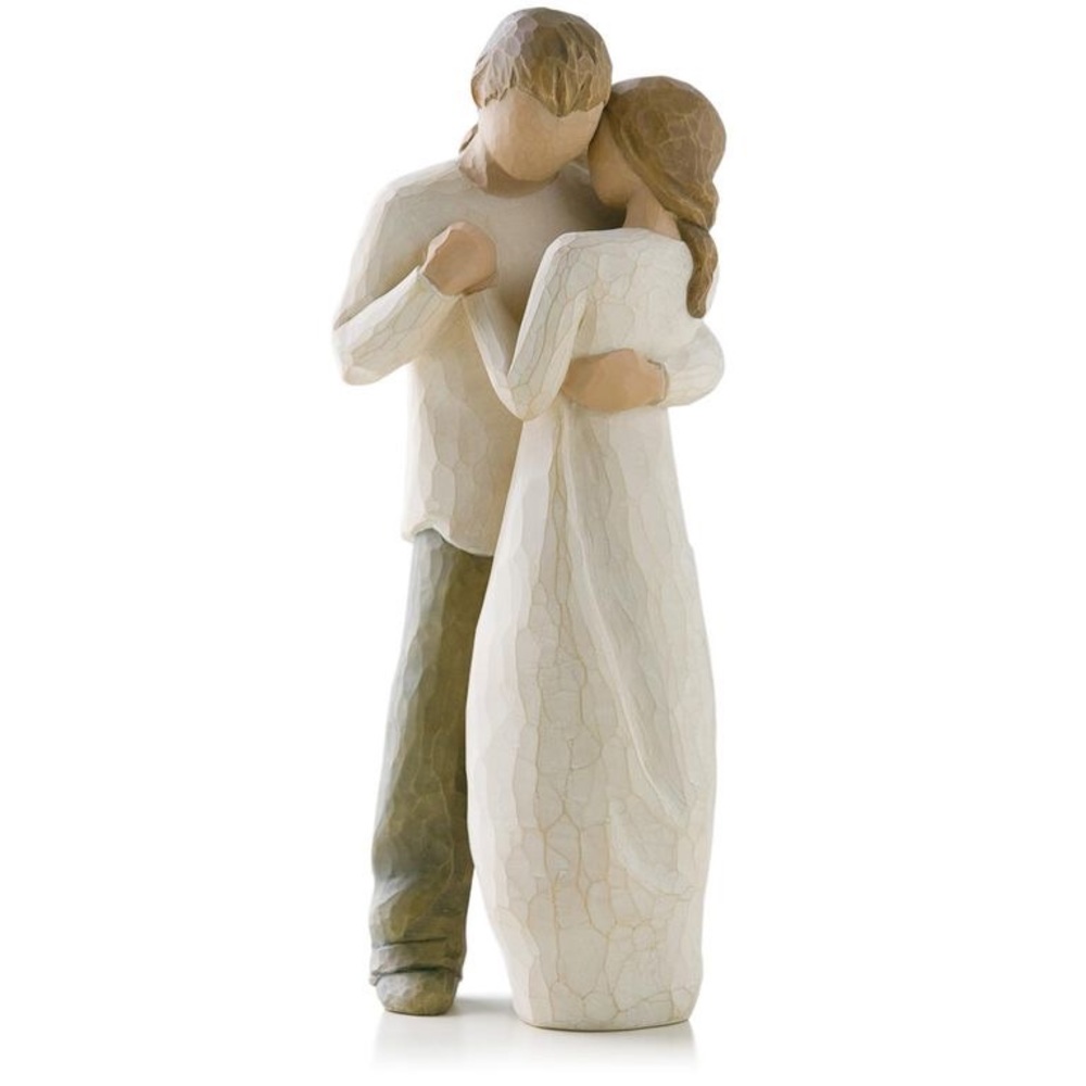 9”h hand-painted resin figure
Figure of standing couple embracing or dancing.